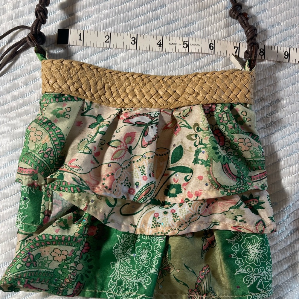 Fun BOHO shoulder bag with a touch of sparkle and ruffles.